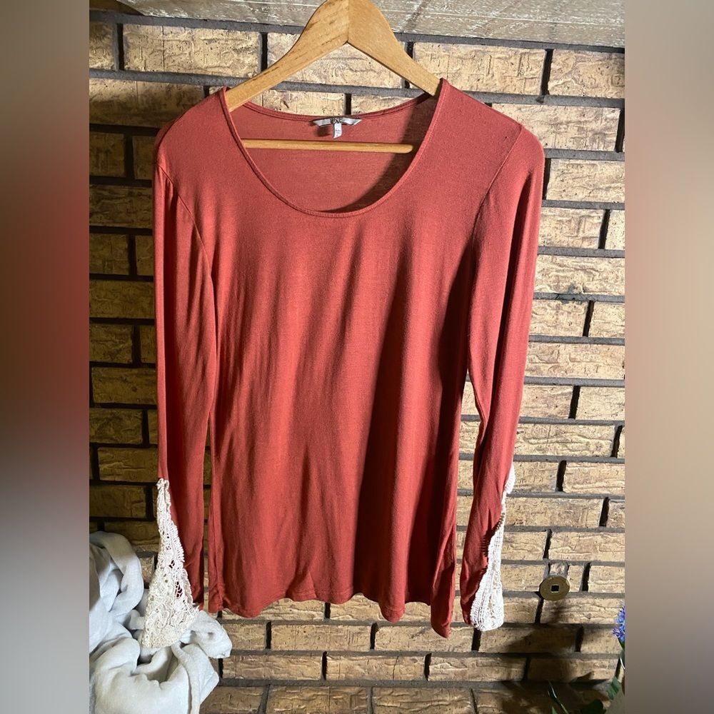 Burnt orange bke top‎